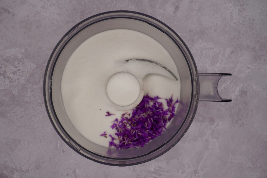 Lavender florets and sugar in a food processor. 