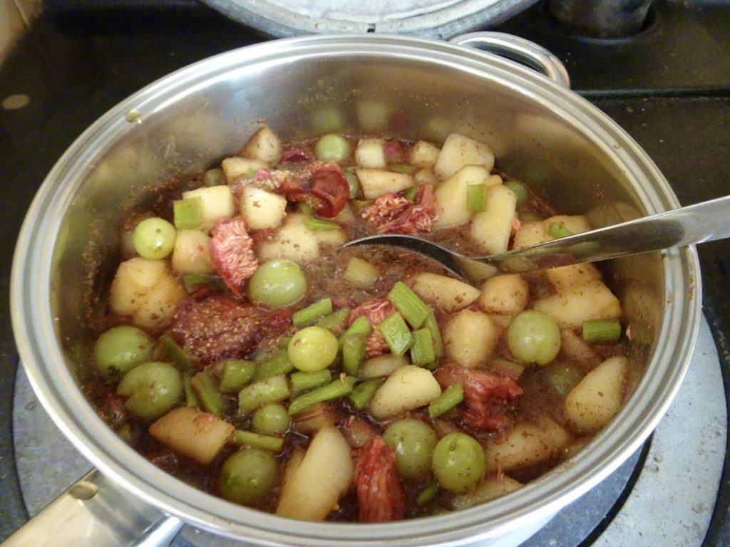Making homemade mixed fruit chutney