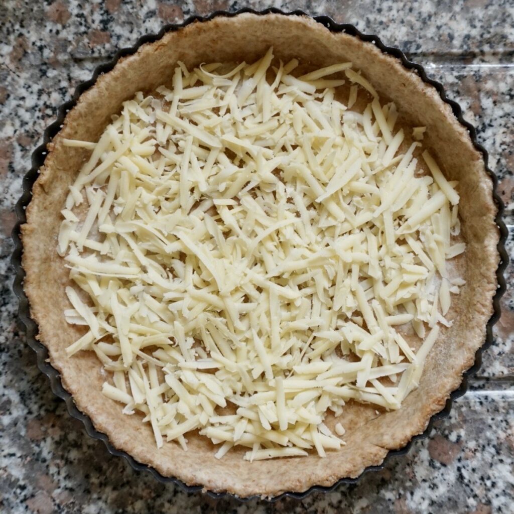 Pastry case with grated cheese
