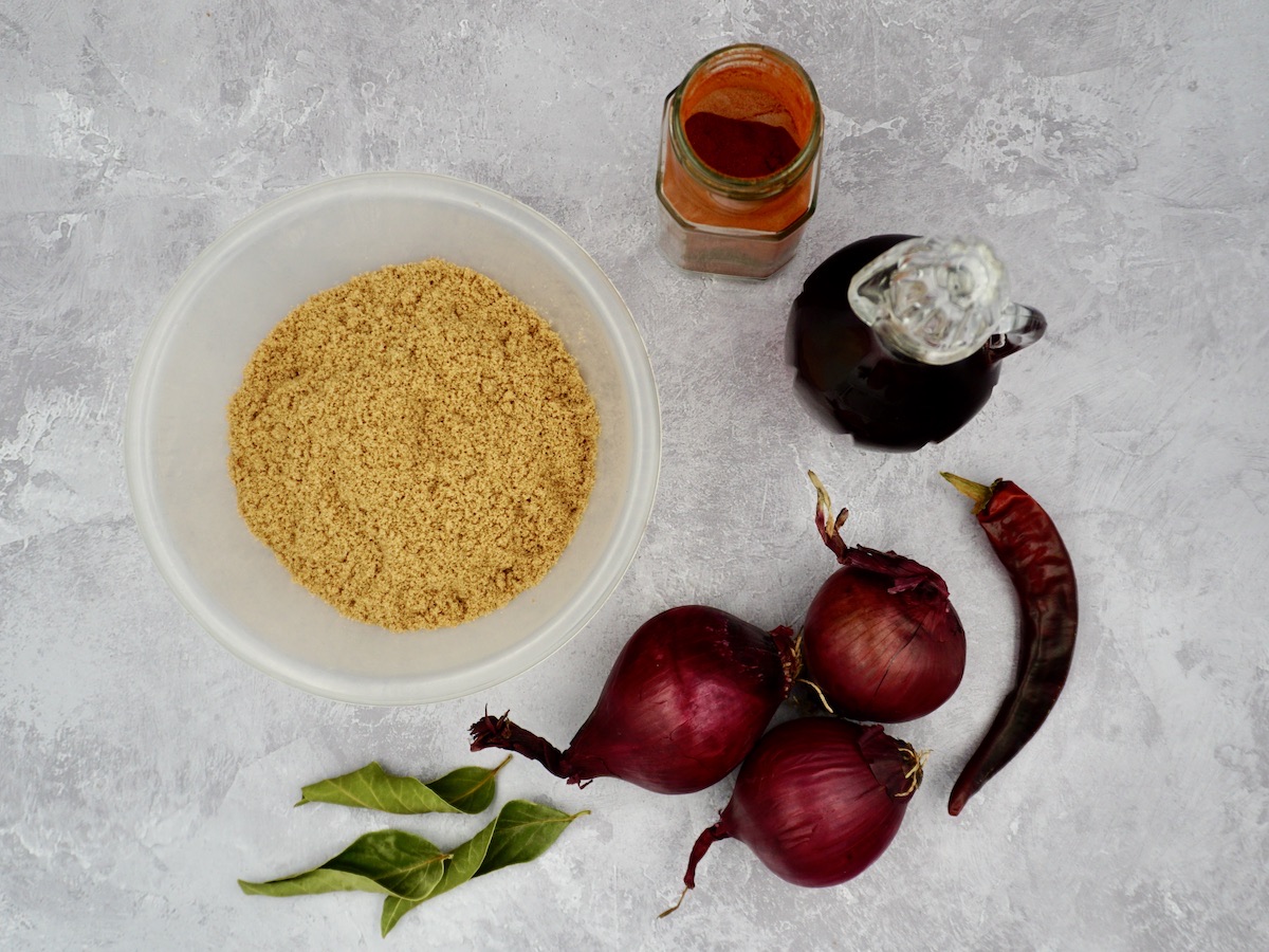 A selection of ingredients for sweet red onion chutney
