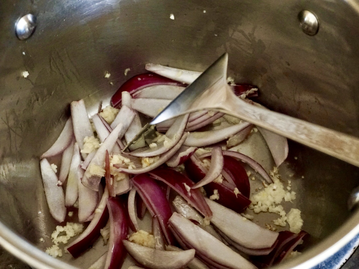Cook onions and garlic in olive oil