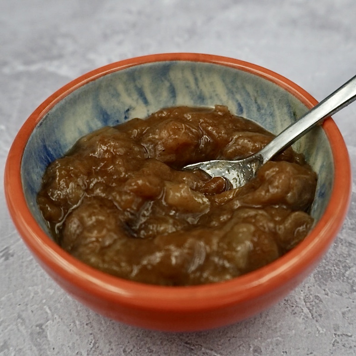 A bowl of mixed fruit chutney