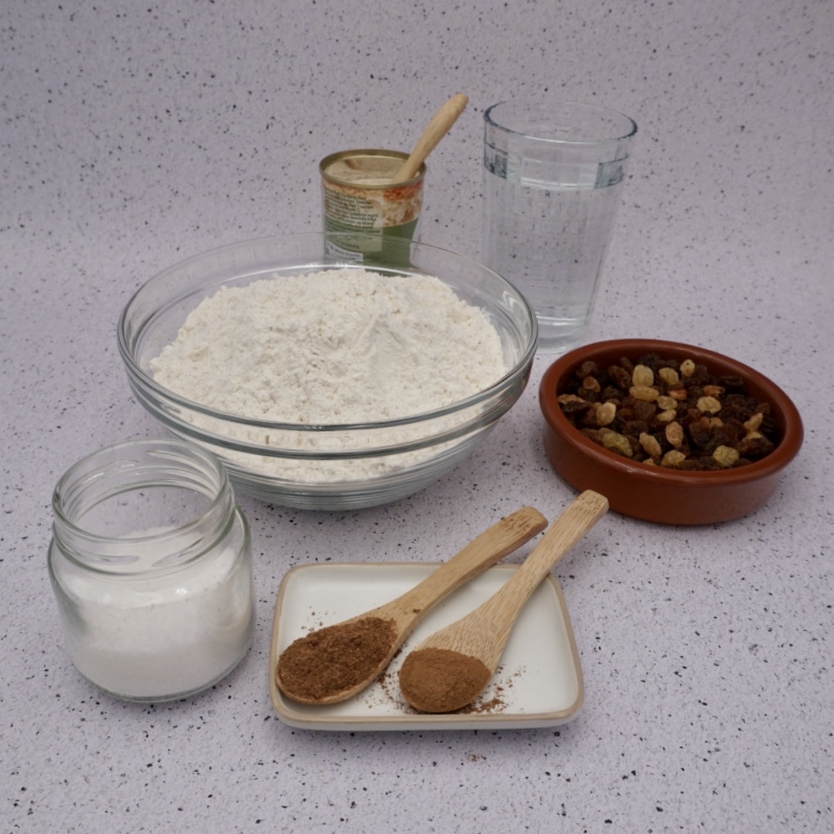 Flour, yeast, water, dried fruit, salt and spices