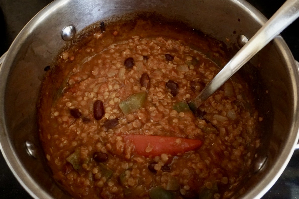 Lentil chilli cooking in a pan