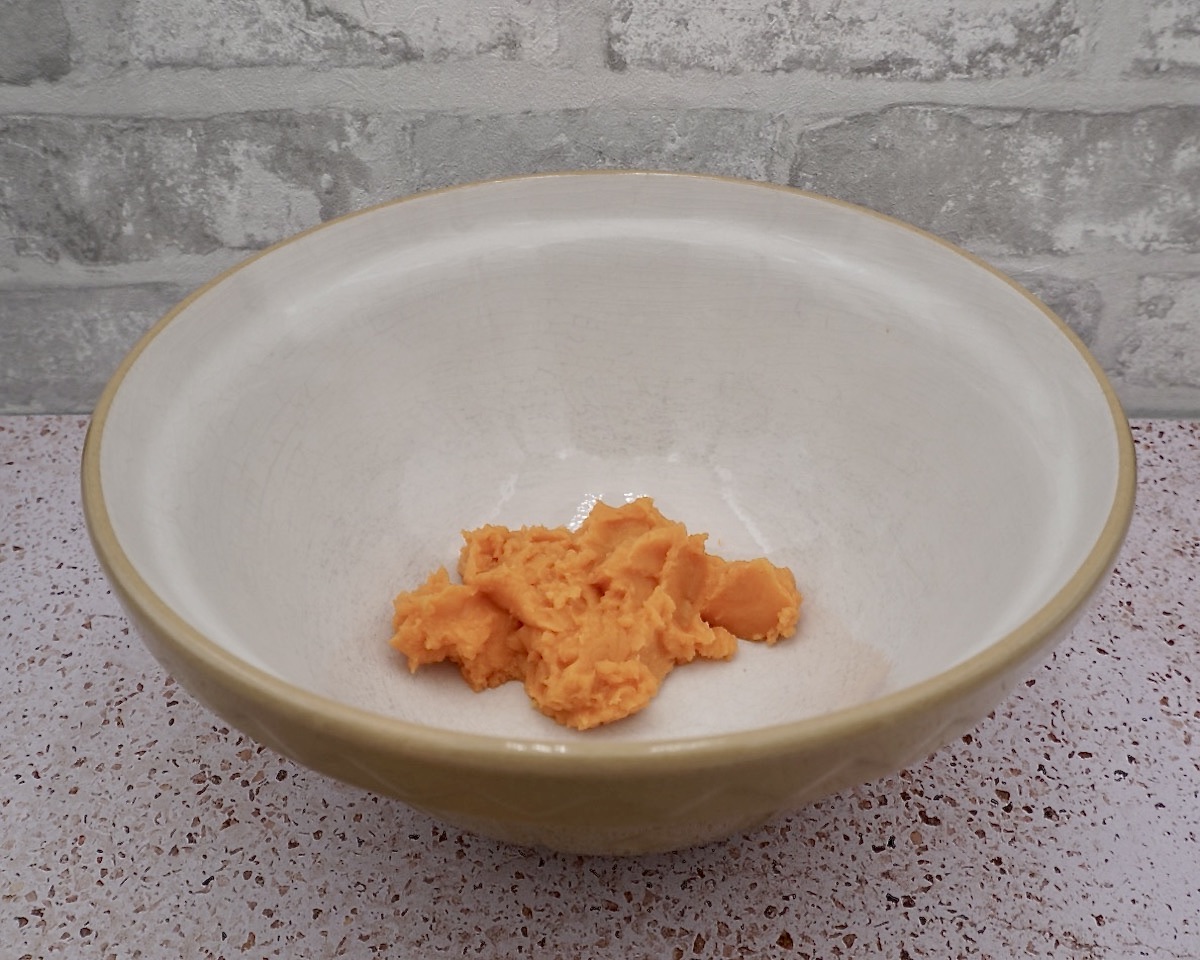 Mashed sweet potato in a baking bowl