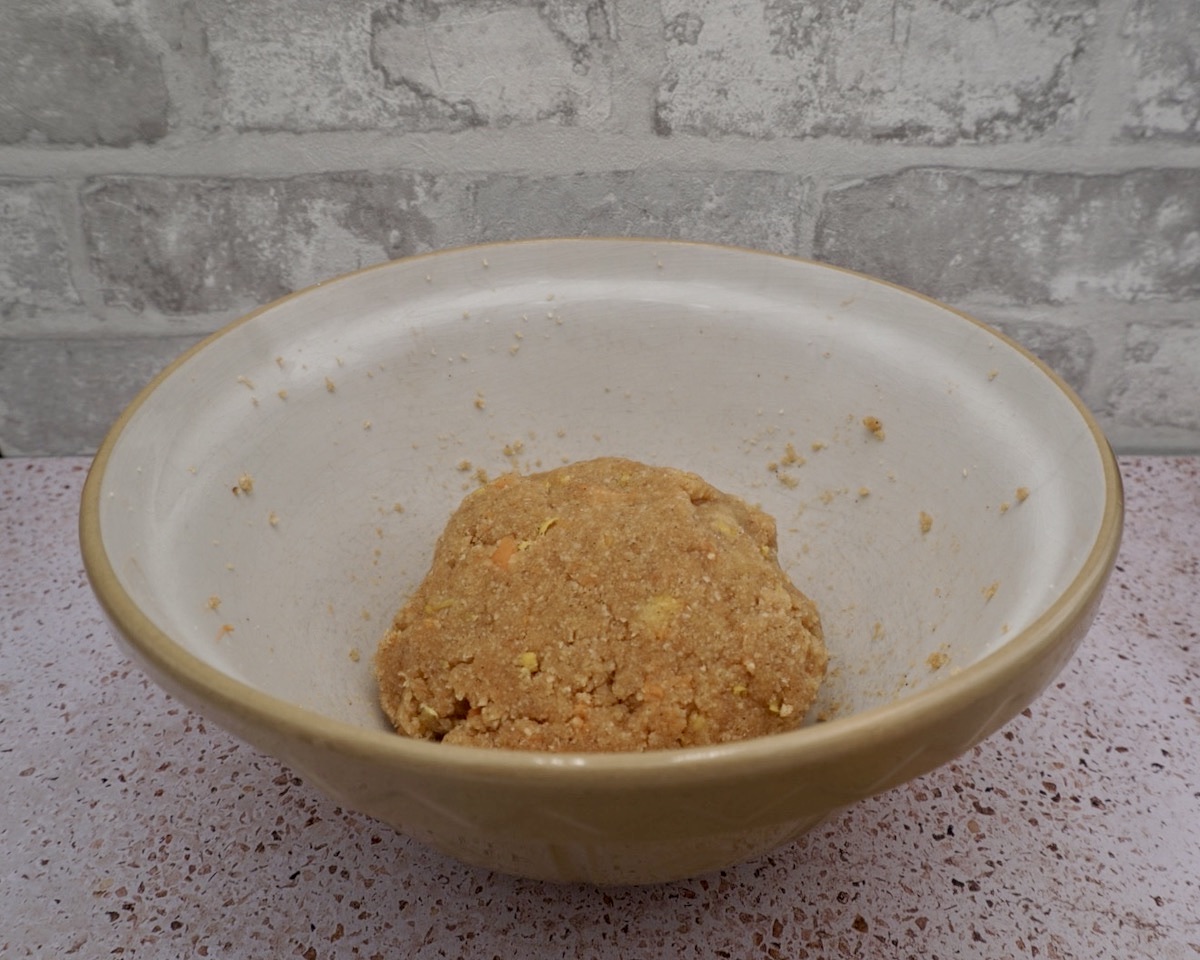 A ball of biscuit dough in a bowl