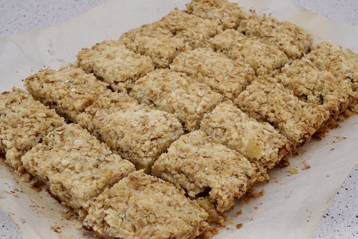 Cranberry berry and apple crumble bars cut into squares