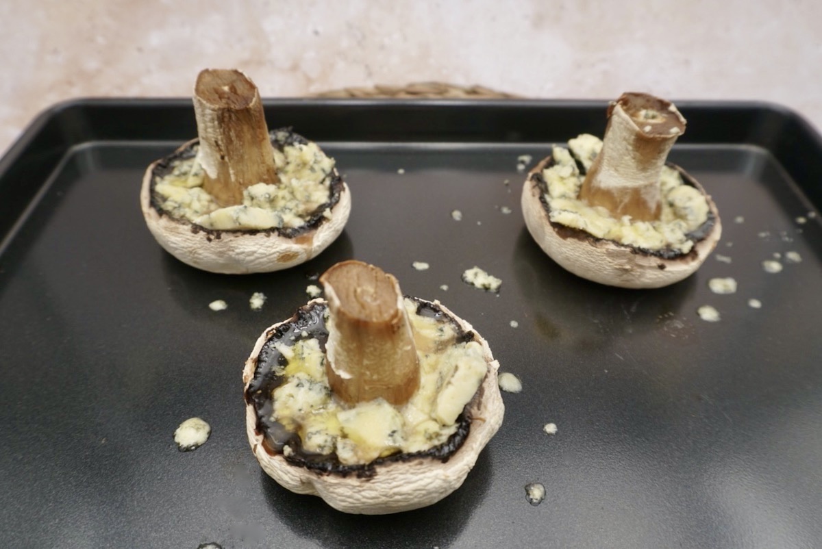 Three mushrooms with cheese