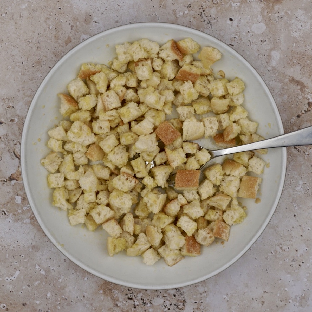 Unbaked croutons in a bowl