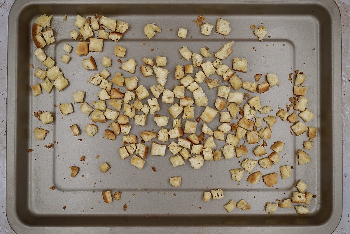 A tray of freshly baked croutons