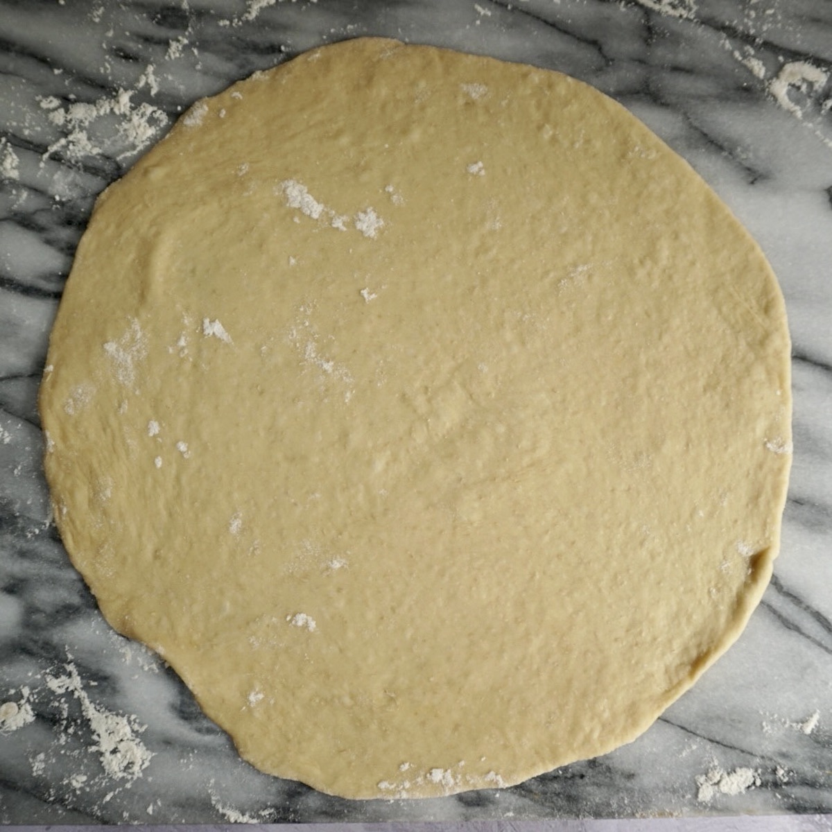 A circle of bread dough.