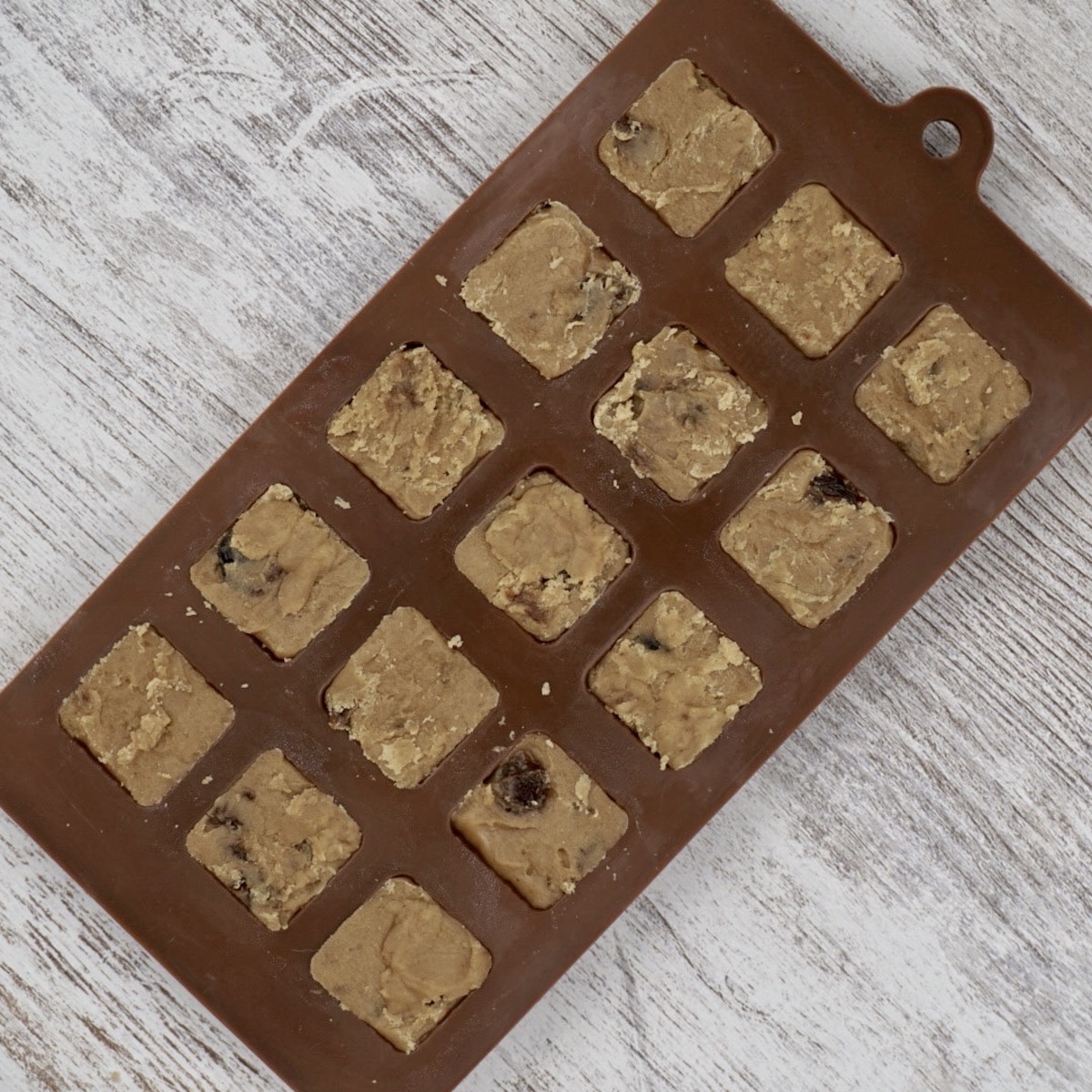 Rum and raisin fudge in a sweet mould.