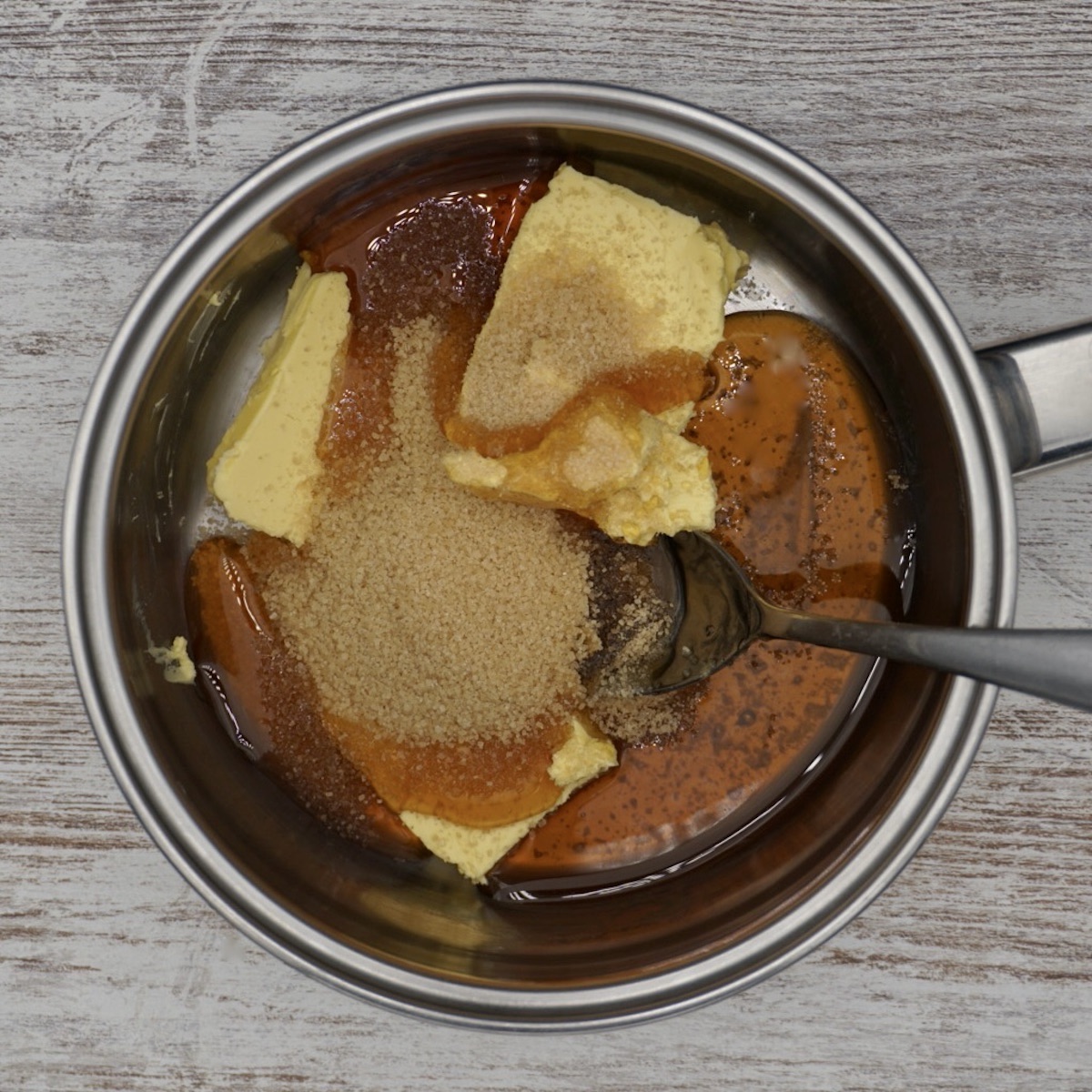 A pan with butter, sugar and honey.