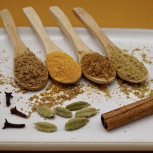 Ground and whole spices for pilau rice seasoning.