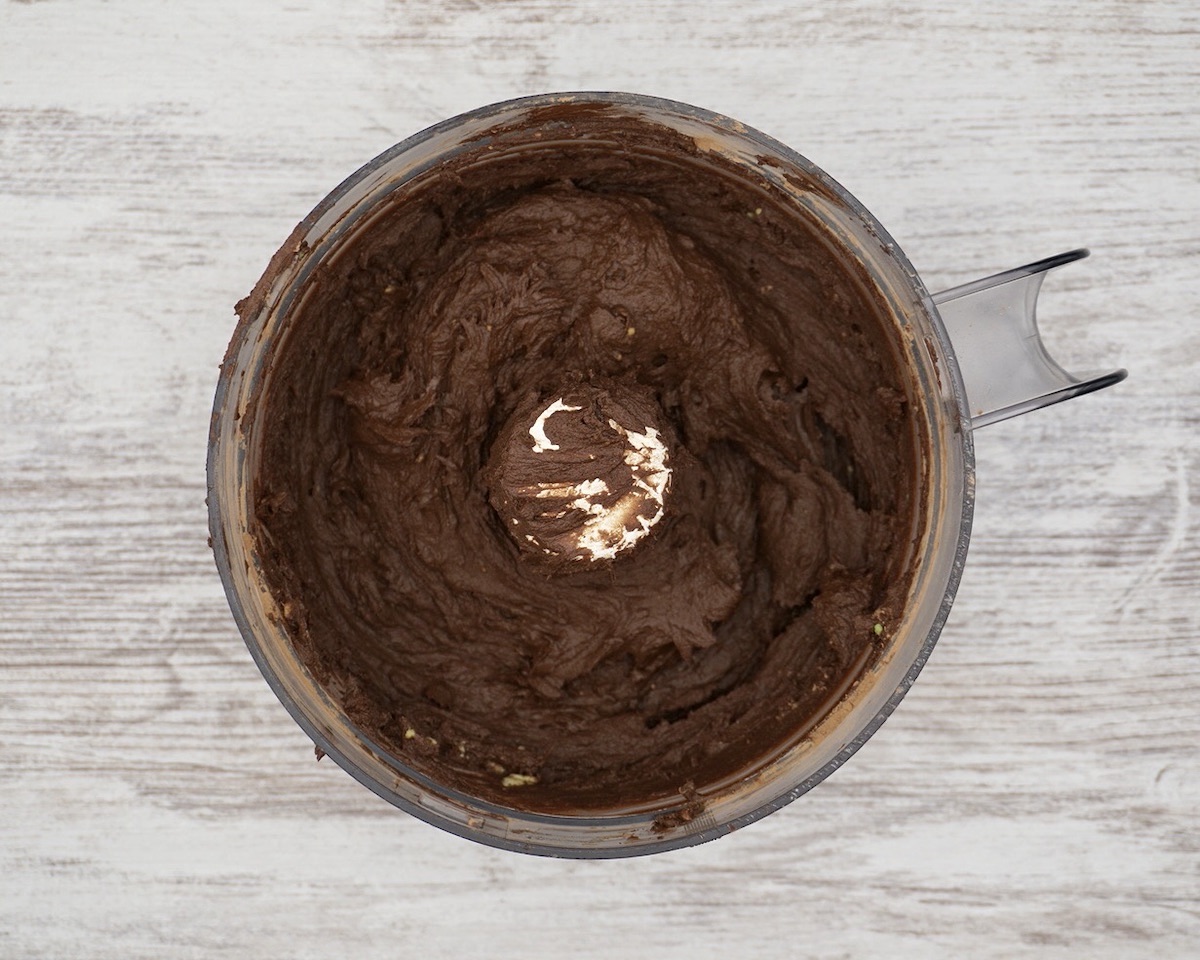 A food processor containing chocolate mousse.