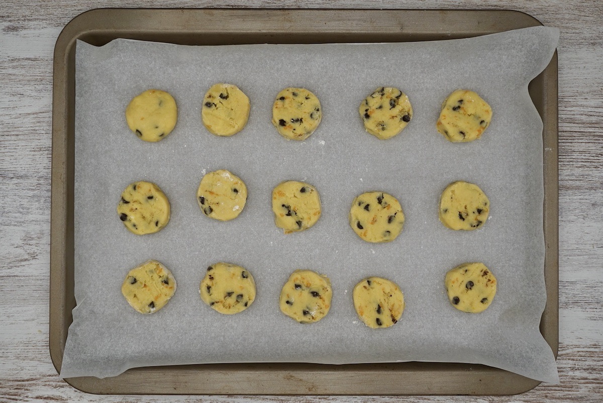 Unbaked cookies on a baking tray.