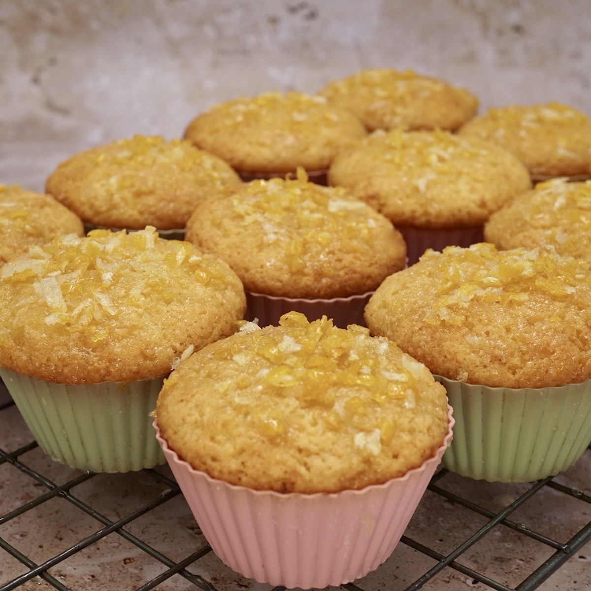 A group of lemon drizzle cupcakes.