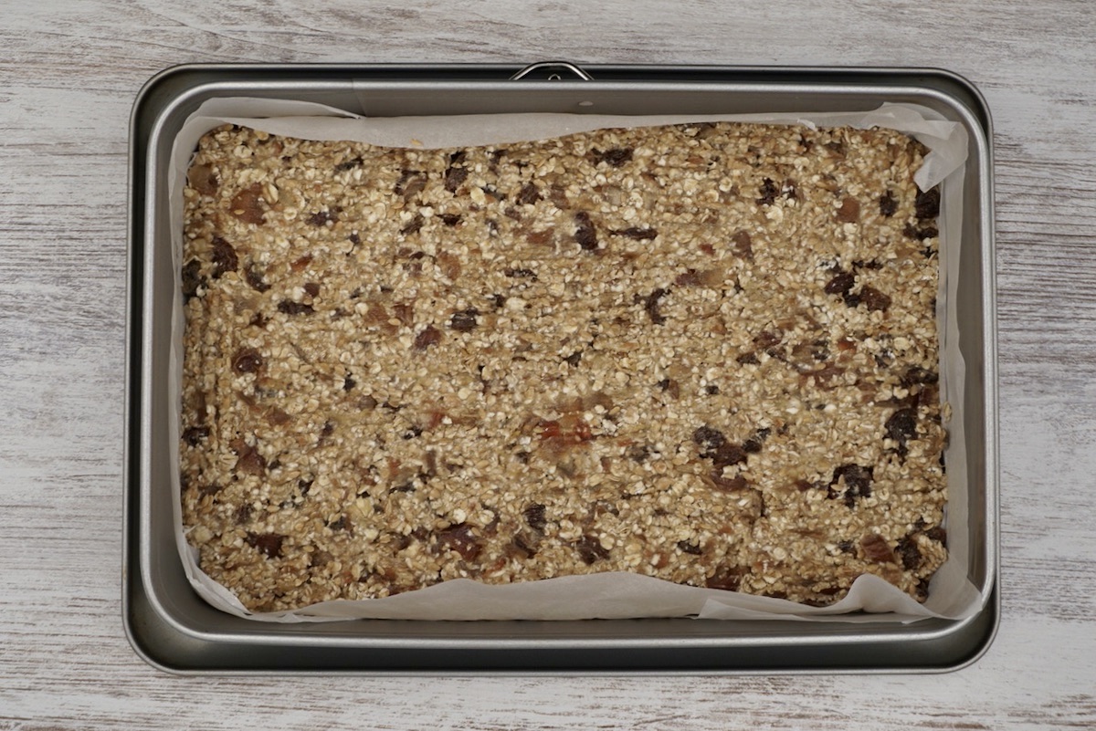 Unbaked flapjack in a tin.
