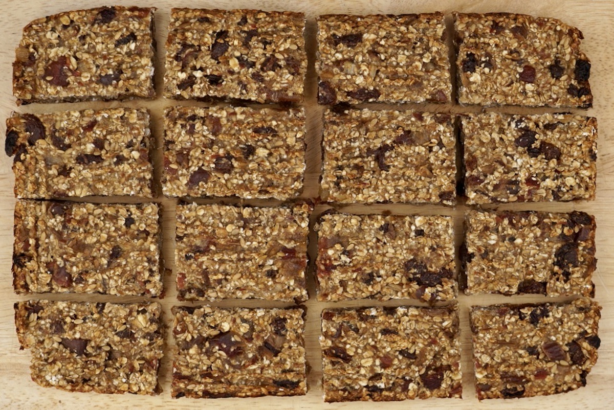 Portions of banana flapjack on a board.