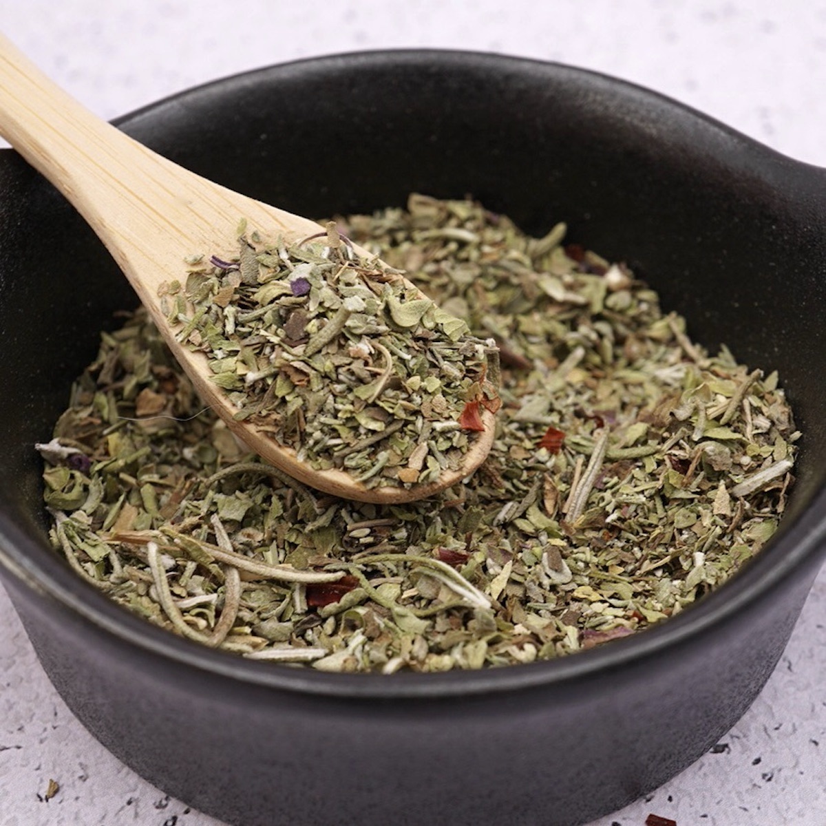 A bowl of homemade seasoning for pasta sauce. 