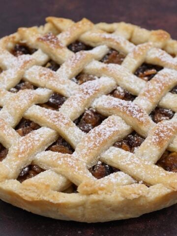 A lattice topped tart with apple and mincemeat.