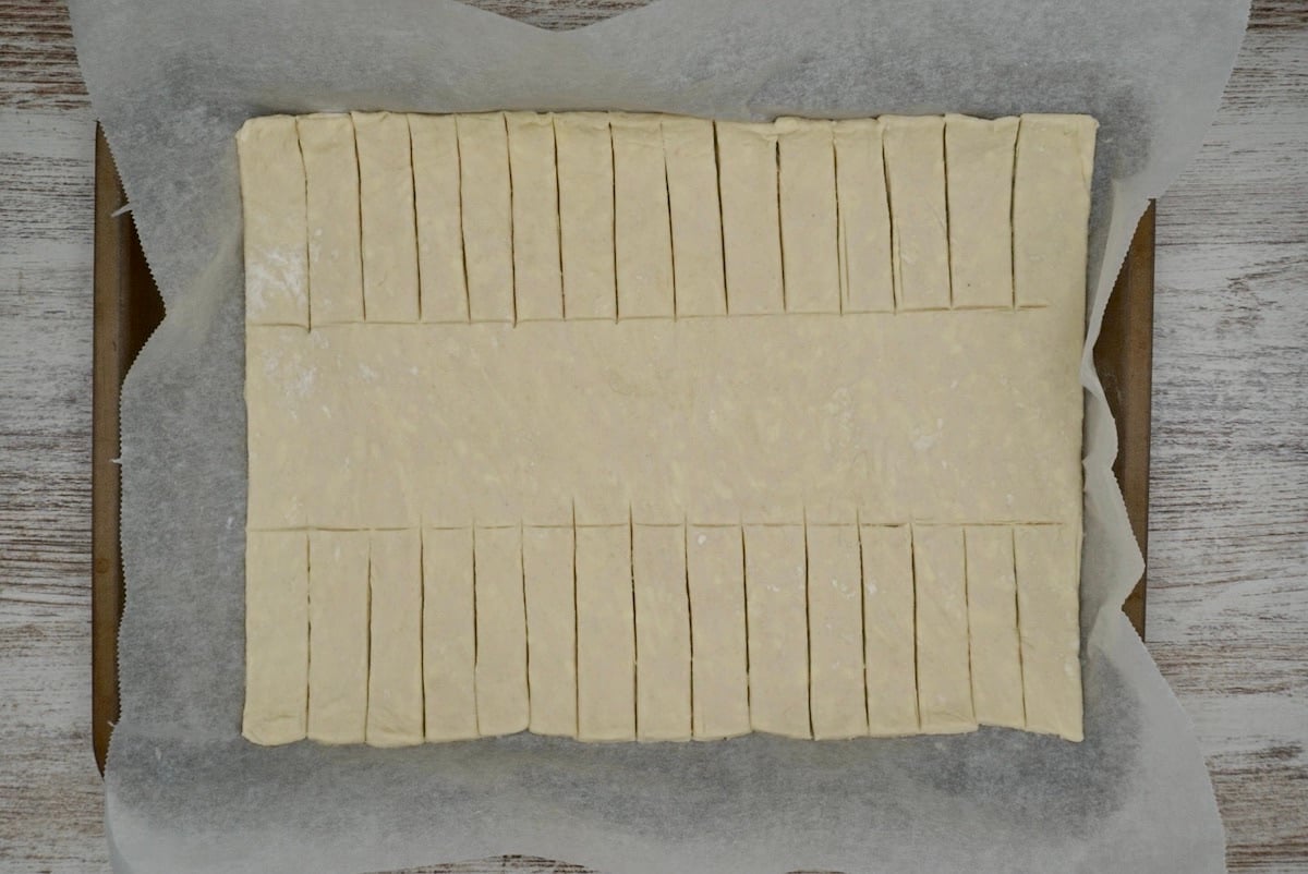 A rectangular sheet of pastry cut ready to make a strudel.