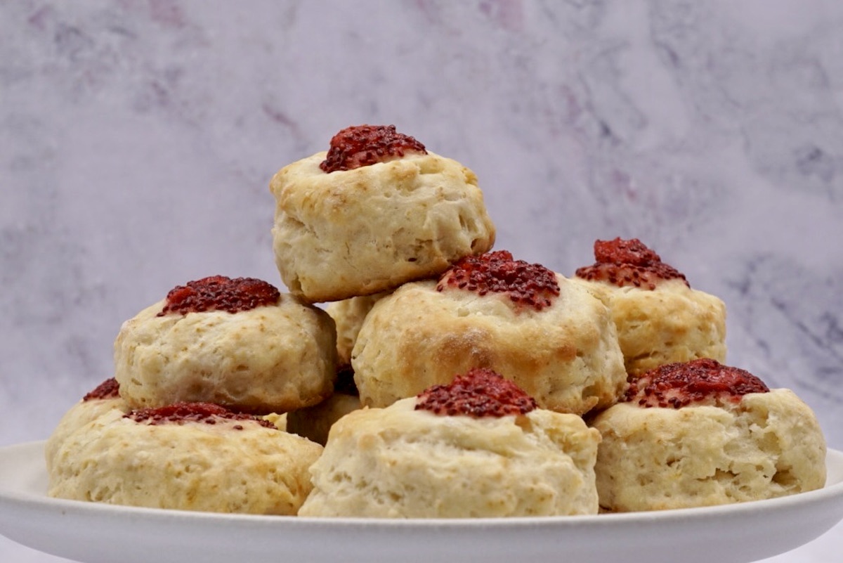 A stack of jam filled scones.