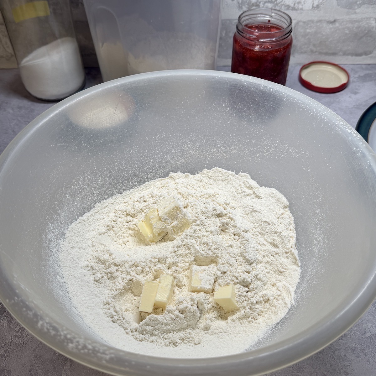 Flour and butter in a bowl.