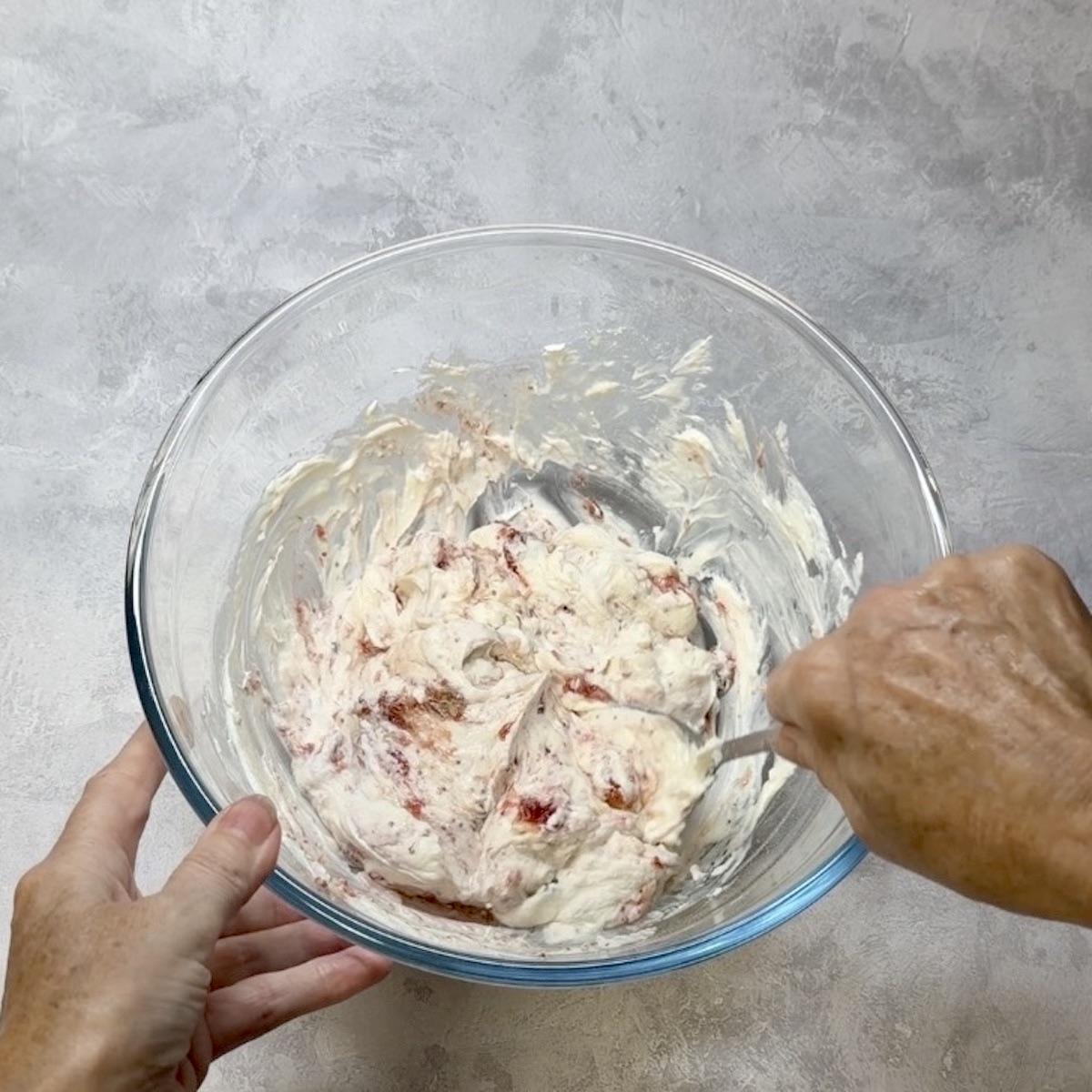 Fig mousse being mixed in a bowl.